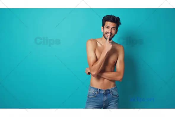Shirtless Man in Playful Pose
