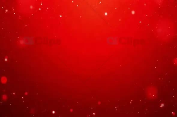 Festive Red Background with Floating Particles and Bokeh