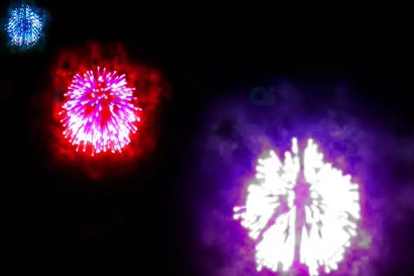 Multi-Color Fireworks Burst in Red, Blue, and White Against Night Sky