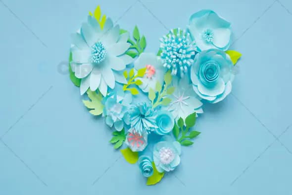 Heart-Shaped Paper Flower Arrangement on Blue Background