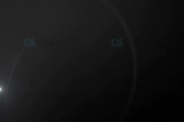 Minimalistic Space Scene with Lens Flare and Planetary Outline