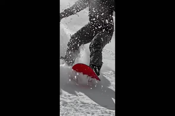 Snowboarder's Dynamic Edge Turn