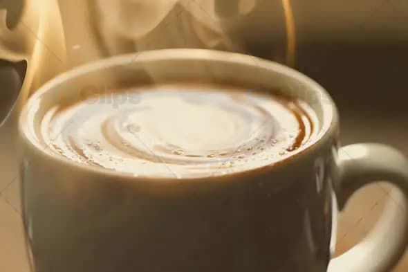 Close-Up of Steaming Hot Coffee with Swirling Surface