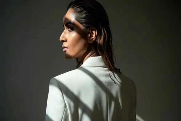 Elegant Indian Woman in White Blazer