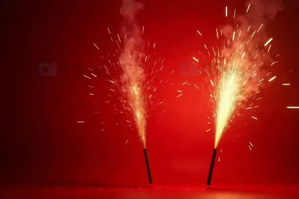 Dual Sparklers on Vibrant Red Background