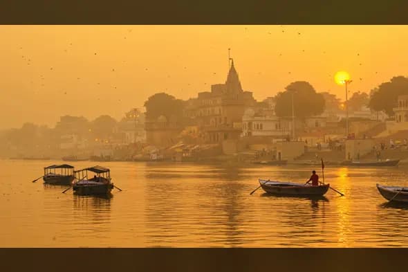 Sunrise over Varanasi Ghats with Boats on the Ganges River