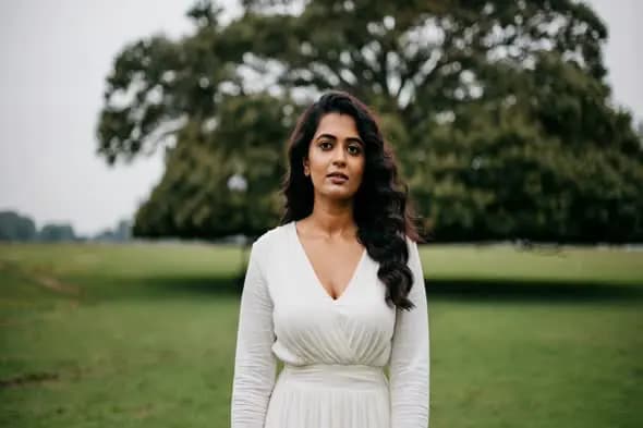 Woman in White Dress in Serene Outdoor Setting