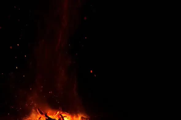 Mesmerizing Campfire Flames Sparks Rising Night Sky