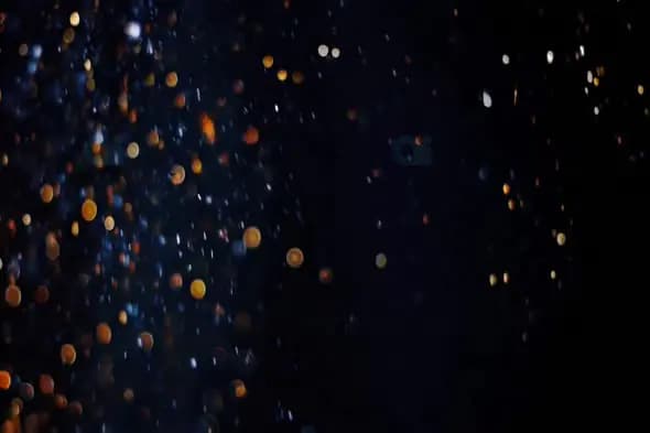 Colorful Floating Dust Particles with Bokeh Light Effects