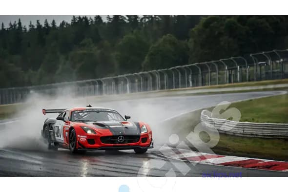 Red Mercedes Race Car on Wet Track