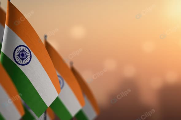 Indian Flags Waving at Sunset Background