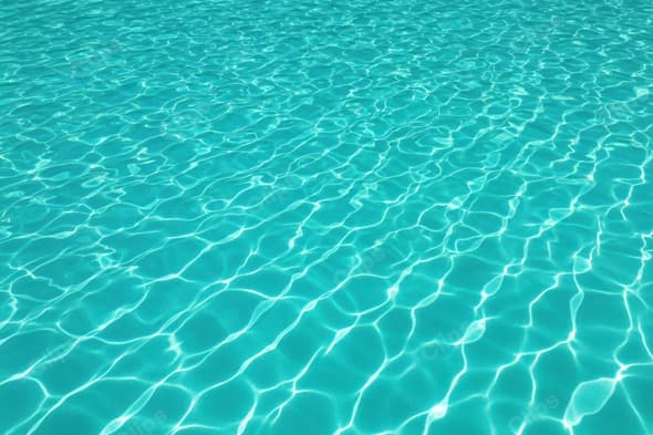 Clear Blue Pool Water with Sun Reflections