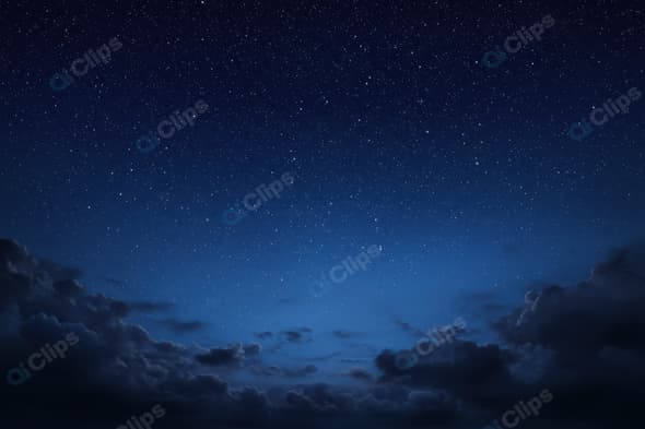 Starry Night Sky Above Dark Clouds