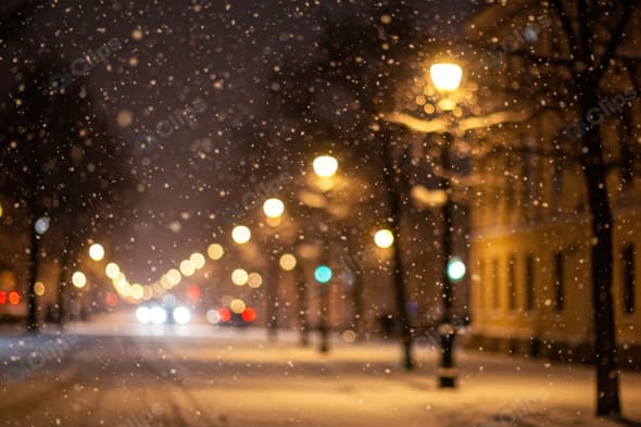Winter Night Snowfall on City Street with Lights