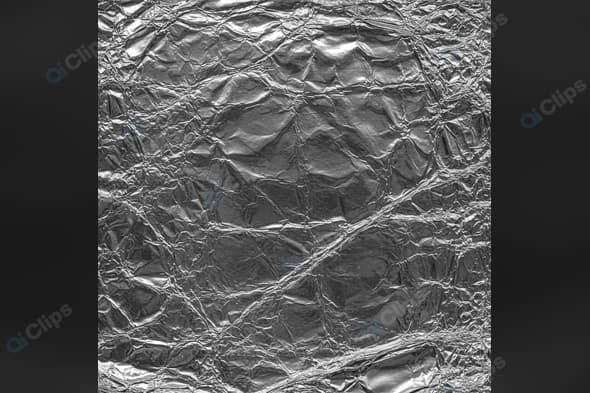 Crumpled Metallic Silver Foil Texture Background