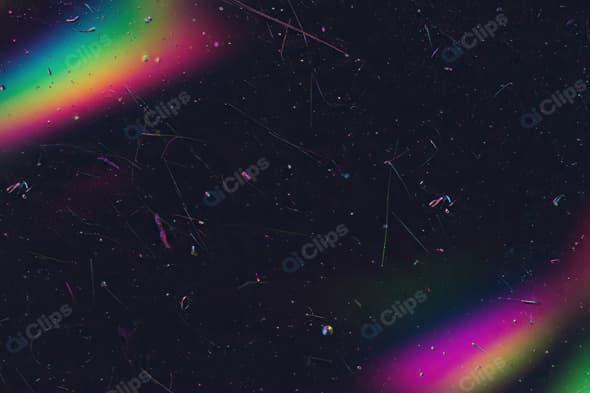 Colorful Abstract Light Streaks and Dust Particles on Black Background