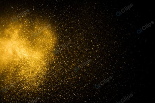 Golden Sparkling Dust Particles on Black Background