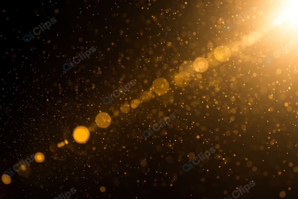 Golden Dust Particles in Sunlight Beam