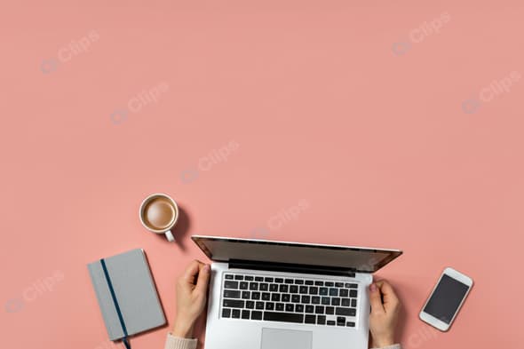 Workspace Flat Lay with Laptop, Coffee, Notebook, and Phone