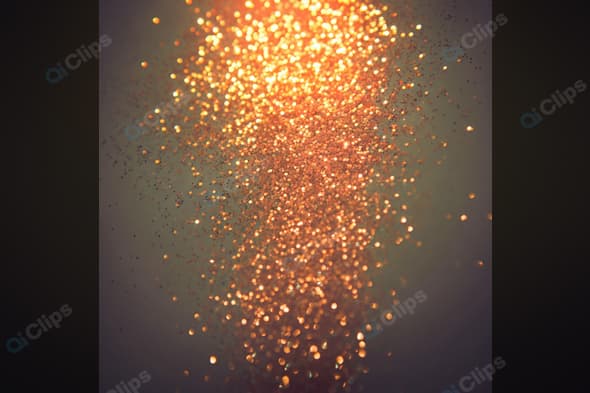 Golden Sparkling Glitter Falling in Soft Focus