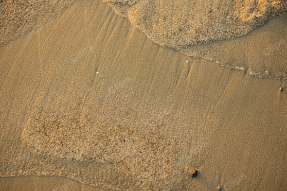 Golden Sand Texture with Gentle Wave Patterns