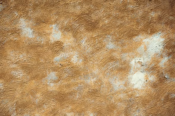 Textured Earthen Wall Surface Pattern