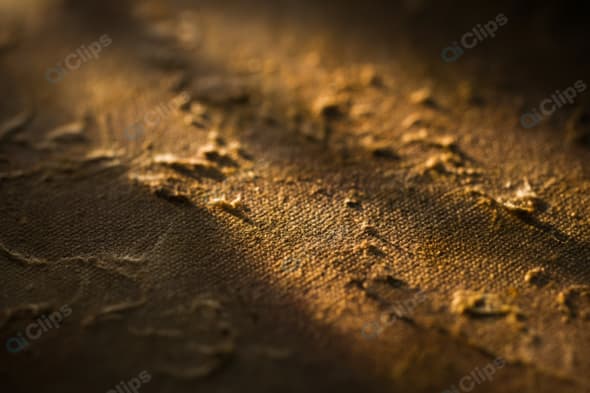 Close-Up Texture of Worn Brown Fabric Canvas