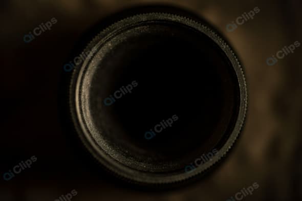 Close-Up of Vintage Camera Lens in Low Light