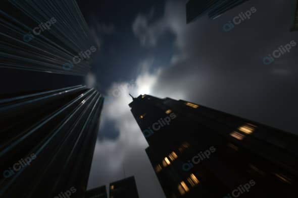 Nighttime Skyscraper Silhouette with Cloudy Sky