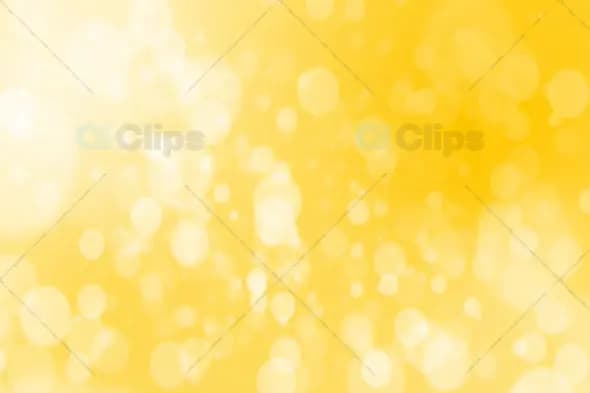 Golden Yellow Bokeh with Soft Glow and Blurred Light Orbs