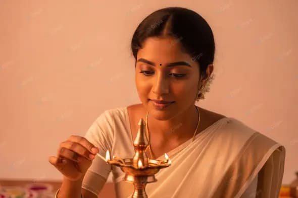 Serene Indian Woman Lighting a Traditional Brass Lamp