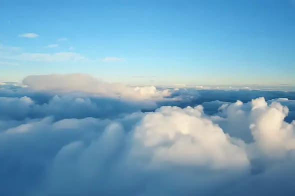 Aerial View of Majestic Cloud Formation Above Sky