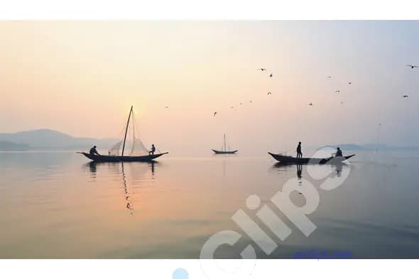 Traditional Fishermen on a Calm Lake at Sunrise